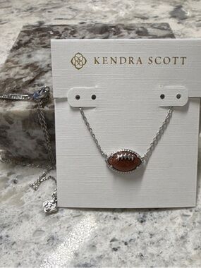 Kendra Scott Silver Necklace with Brown Football Pendant